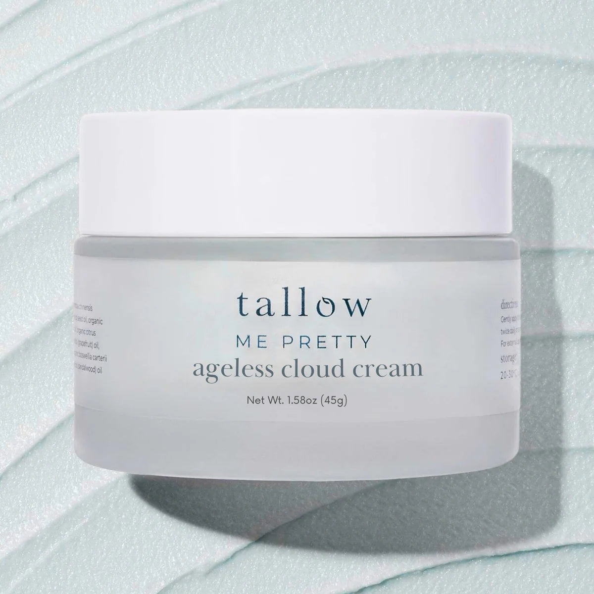 Tallow Me Pretty ageless cloud cream jar on a light blue background