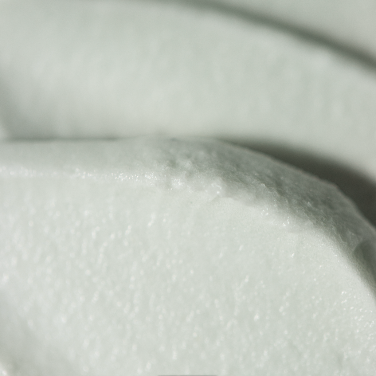 Macro shot capturing the rich and whipped texture of Tallow Me Pretty's Anti-Aging Cloud Cream, highlighting the creamy consistency that helps deliver skin nourishment and anti-aging benefits for a youthful and radiant complexion.