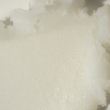 Microscopic view of Tallow Me Pretty's herbal chest rub, highlighting the smooth and pure texture that's enriched with clean ingredients to help sooth dry skin.