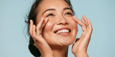 woman applying skincare