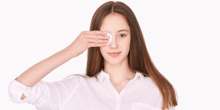 girl wiping her eye makeup 