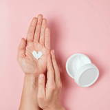 lotion heart in hand