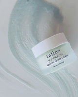 Neptune Tallow vs Tallow Me Pretty: Tallow Me Pretty Ageless Cloud Cream jar on a swirl of blue tallow cream