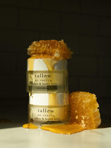 Tallow and honey balm reviews: stacked jars of Tallow and Honey Balm topped with dripping honeycomb