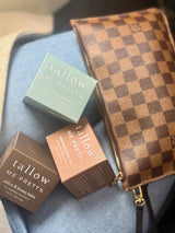 Neptune Tallow review comparison: Tallow Me Pretty product boxes in a checkered travel pouch