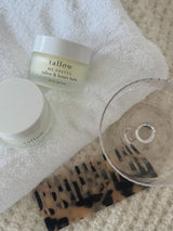 Best tallow honey balm: Tallow and Honey Balm jar on a soft white towel