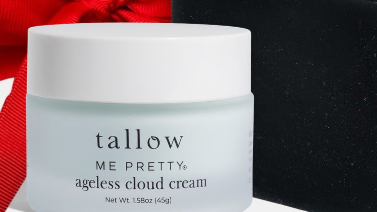 Christmas gifts for sisters: Ageless Cloud Cream jar with a red gift ribbon and black box