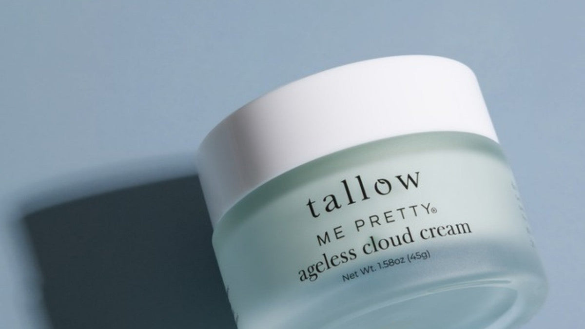 Beef tallow and retinol: Ageless Cloud Cream jar casting a shadow on a soft blue background