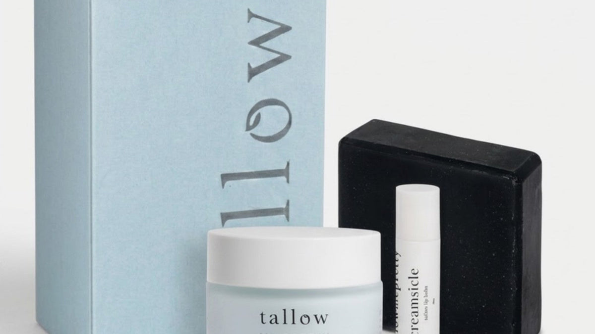 Unique Christmas gifts for adults: gift box with Ageless Cloud Cream, a charcoal tallow soap bar and creamsicle lip balm