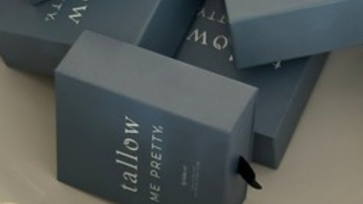 Peppermint lip balm benefits: Tallow Me Pretty lip balm gift boxes resting on pearls