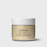 Jar of Tallow Me Pretty Tallow & Honey Balm, with creamy honey-colored contents, displaying its natural and organic ingredients for versatile skin care.
