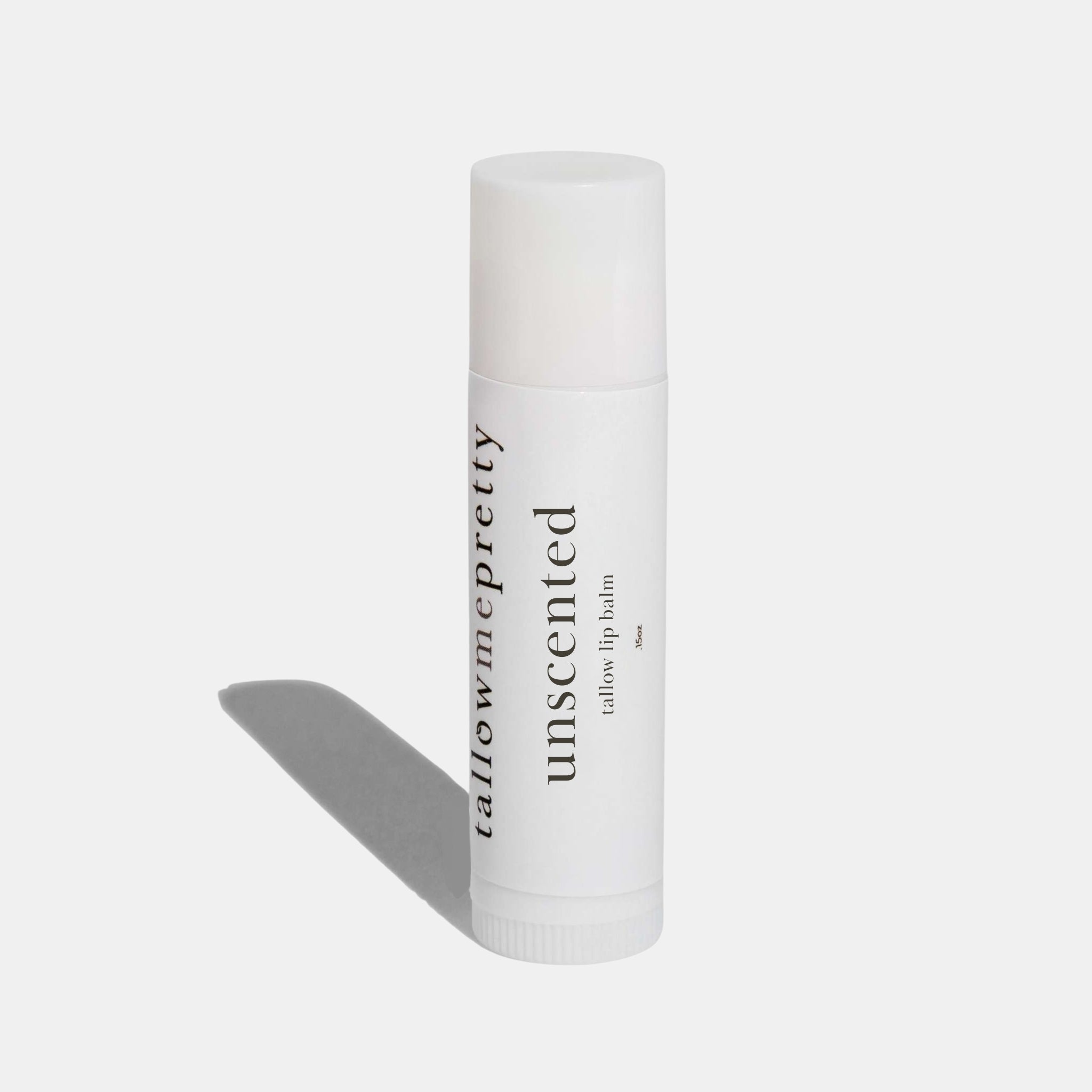 unscented tallow lip balm white background with shadow