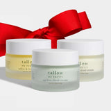 Three jars of tallow, grass fed, grass finished, best gift for wellness conscious products with a red ribbon on a white background